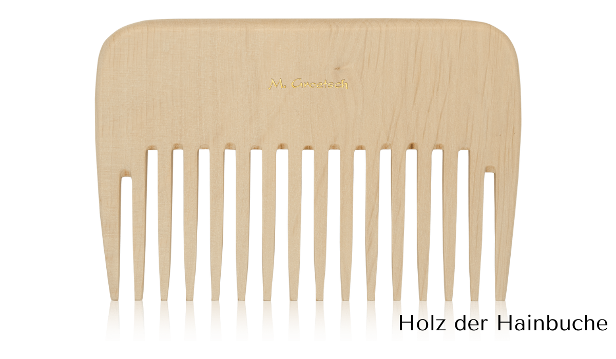 
                  
                    Lockenkamm aus Holz - 12cm breit
                  
                