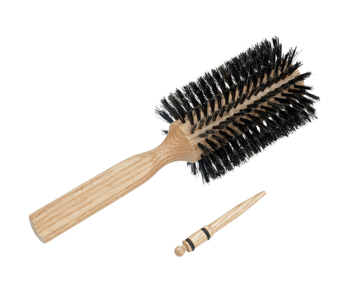 
                  
                    Brosse sèche-cheveux en poils naturels avec épingle pour sectionner les cheveux
                  
                